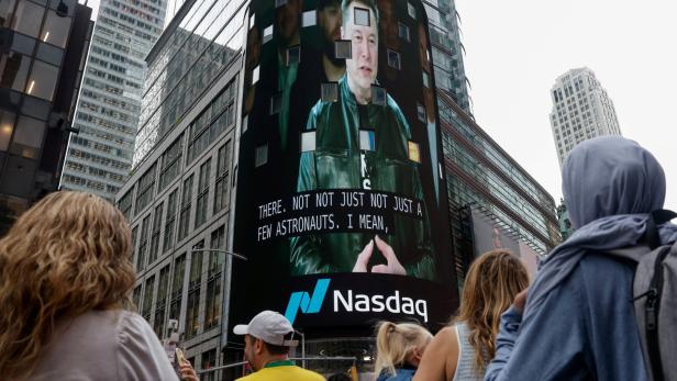 A billboard of SpaceX is pictured on the day of SpaceX's initial public offering (IPO) at the Nasdaq MarketSite, in New York City