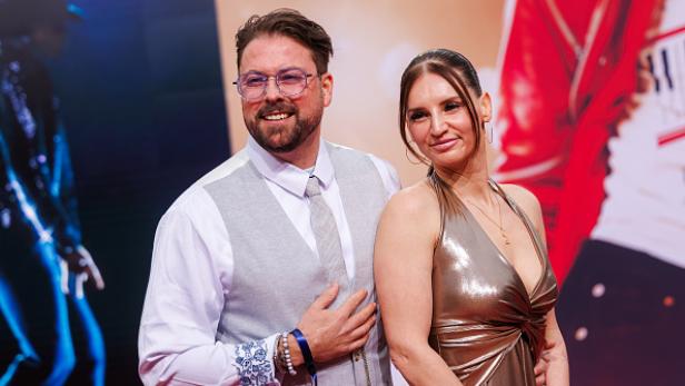 Felix von Jascheroff mit Partnerin bei einem Event