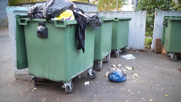 household waste, garbage cans in the city block