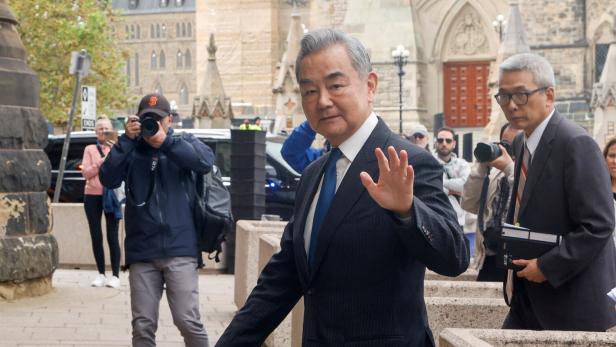China's Foreign Minister Wang Yi arrives for a meeting with Canada's Prime Minister Mark Carney in Ottawa