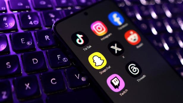 Illustration shows TikTok, Instagram, Facebook, Snapchat, X, Reddit, Twitch, Threads app icons