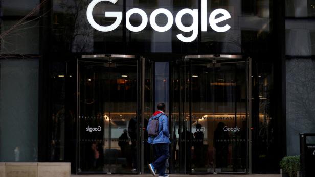 FILE PHOTO: The Google logo is pictured at the entrance to the Google offices in London