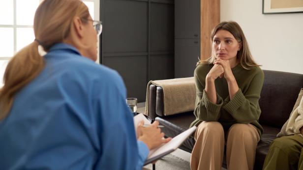 Mother Speaking with Therapist in Therapy Session