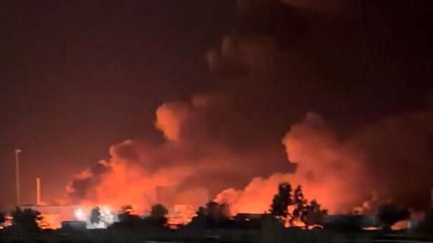 Smoke rises from a port following a U.S. strike in Kuhestak