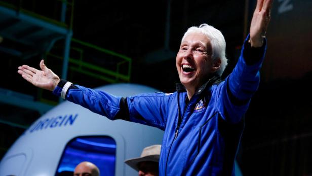 FILE PHOTO: Wally Funk reacts after receiving her astronaut's wings from Blue Origin's Jeff Ashby, a former space shuttle commander at a post-launch press conference, in the nearby town of Van Horn