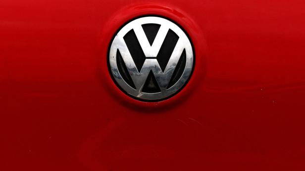 The VW logo sits on a Volkswagen car in Wolfsburg