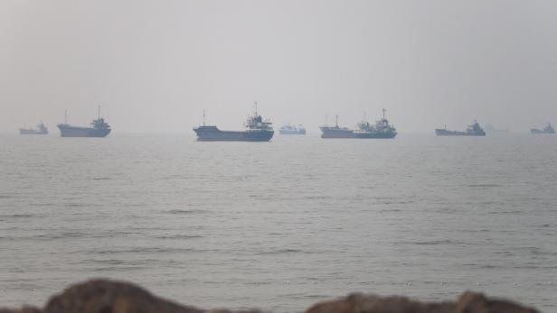 FILE PHOTO: Vessels in the Strait of Hormuz near the beach of Bandar Abbas