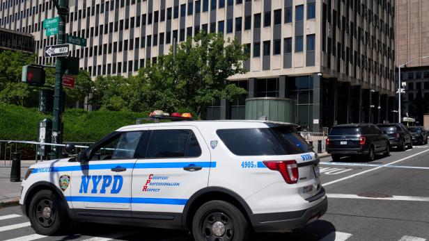Scenes outside of 26 Federal Plaza following reports of a person deploying in incendiary device, in New York City