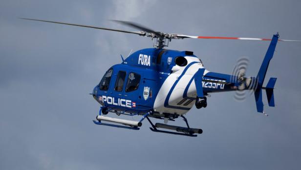 A Puerto Rico Police Department Bell 429 helicopter approaches to land at Mercedita International Airport in Ponce
