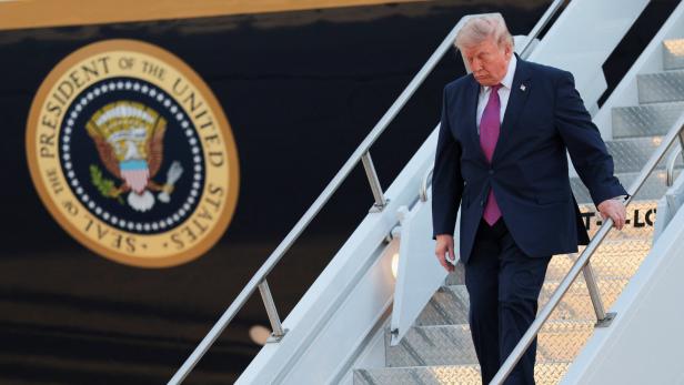 U.S. President Donald Trump deboards Air Force One, in South Dakota