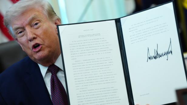 US President Donald Trump signs executive order on election integrity