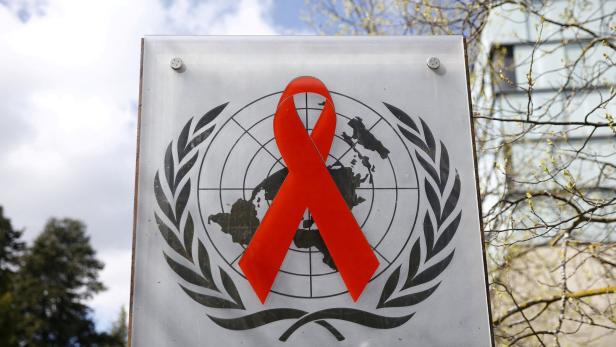FILE PHOTO: Logo pictured outside United Nations AIDS agency (UNAIDS) building in Geneva
