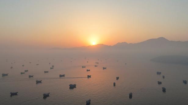 FILE PHOTO: A drone view shows vessels in the Strait of Hormuz, as seen from Musandam