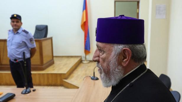 Criminal trial of Armenia's chief bishop opens amid state-church tensions