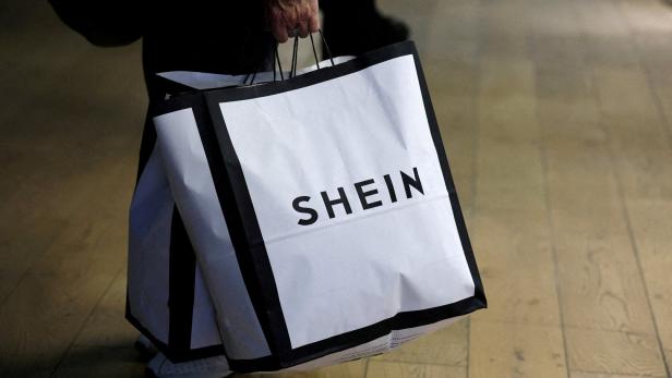 FILE PHOTO: A shopping bag of online fast-fashion giant Shein