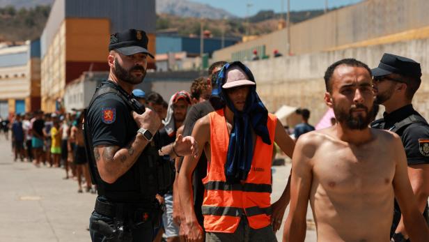 Mass crossings of migrants on foot and by sea from Morocco into Spanish territory, in Ceuta