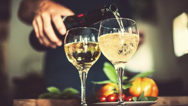 Man pouring sparkling wine