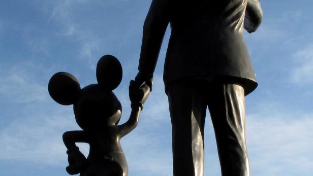 FILE PHOTO: Statues of Walt Disney and Mickey Mouse are seen at Disneyland in Anaheim
