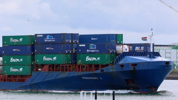 The Pegasus J container ship sails in the port of Rotterdam