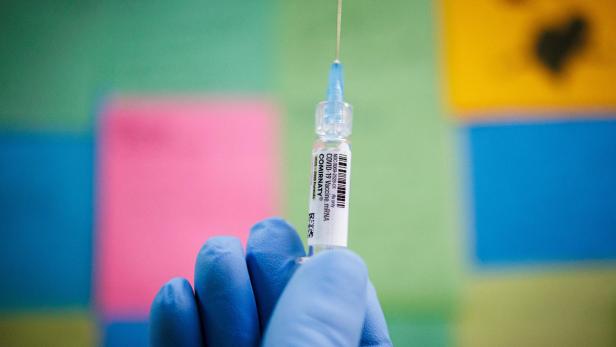 An illustration photo shows a dose of COMIRNATY (COVID-19 Vaccine, mRNA) in Schwenksville