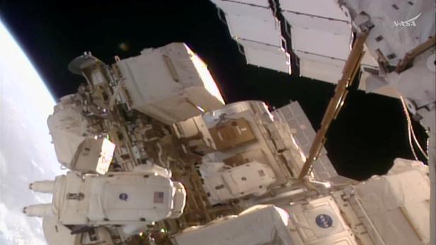 ESA astronaut Sophie Adenot performs a spacewalk to replace a space-to-ground antenna at the International Space Station