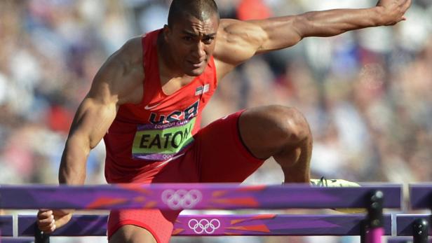 Ashton Eaton of the U.S. clears a hurdle in his men&#039;s decathlon 110m hurdles heat at the London 2012 Olympic Games at the Olympic Stadium August 9, 2012. REUTERS/Dylan Martinez (BRITAIN - Tags: OLYMPICS SPORT ATHLETICS)