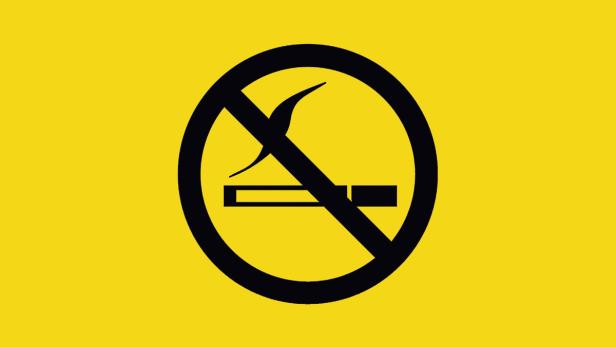 Ein schwarzes „Rauchen verboten“-Schild auf gelbem Grund.