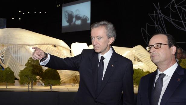 Reichster Franzose, unbeliebtester Präsident: Arnault und Hollande eröffneten im Oktober 2014 gemeinsam das Louis-Vuitton-Museum.