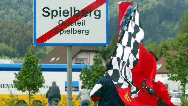 A Ferrari supporter walks towards the A1 race track near Spielberg, 15 May 2003. The Austrian Formula 1 GP on Sunday will be the last one here as Formula 1 boss Bernie Ecclesstone did not extend the contract with the organizers of the race. EPA-PHOTO/DPA/GERO BRELOER