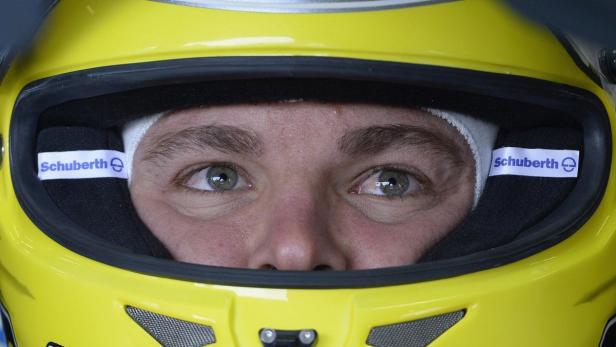 Mercedes Formula One driver Nico Rosberg of Germany watches from his car during final practice ahead of the British Grand Prix at the Silverstone Race circuit, central England, June 29, 2013. REUTERS/Nigel Roddis (BRITAIN - Tags: SPORT MOTORSPORT F1)