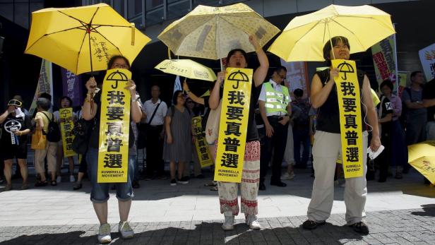 Pro-democracy protesters take part in a rally outs