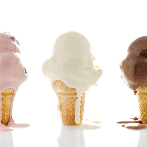 3 melting ice creams , 1 strawberry, 1 chocolate, 1 vanilla