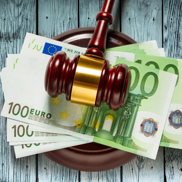 Judge's gavel and one hundred euro banknotes