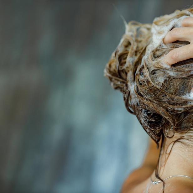 Close up of washing hair with shampoo!