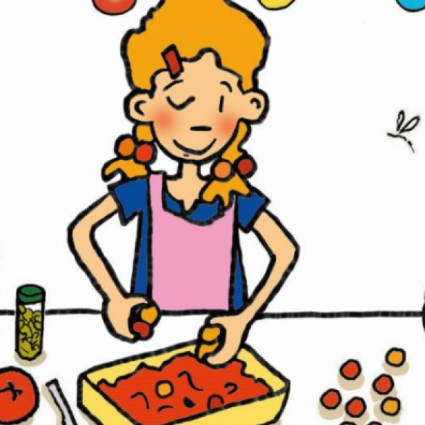 Ein Mädchen mit Zöpfen bereitet eine Mahlzeit mit Tomaten zu.