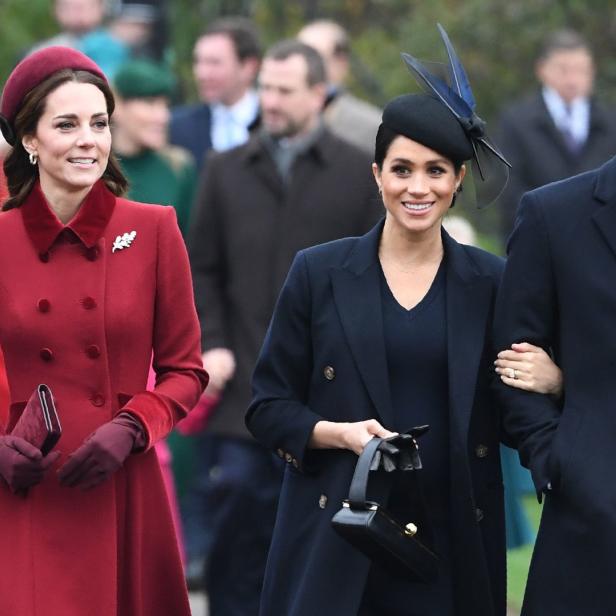 Kate Middleton, Meghan Markle und Prinz Harry bei einem öffentlichen Auftritt.