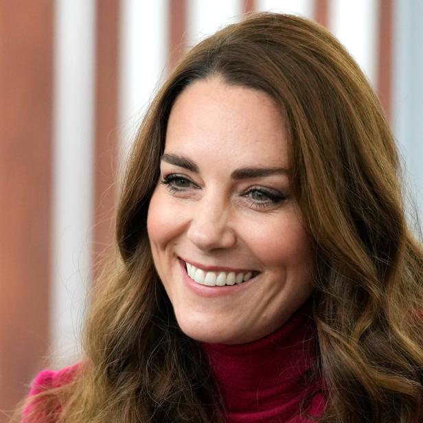Ein Porträt von Catherine, Prinzessin von Wales, die lächelt.