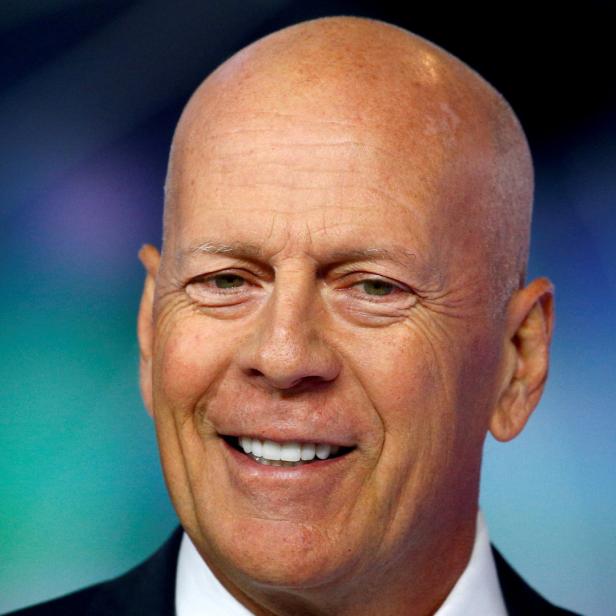 Porträt von Bruce Willis, der lächelt.
