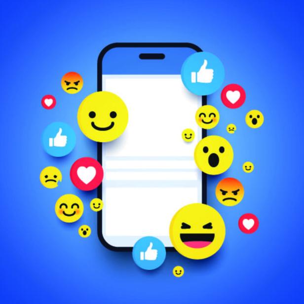 Ein Smartphone ist von verschiedenen bunten Emojis umgeben.