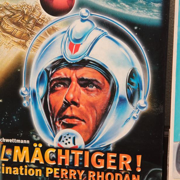 Das Cover eines Perry Rhodan Romans mit einem Mann im Raumanzug.