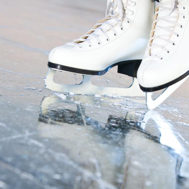 Tilted natural version, ice skates with reflection