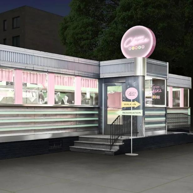 Ein Diner im Retro-Stil mit dem Namen „Lucky Chance Diner“ bei Nacht.