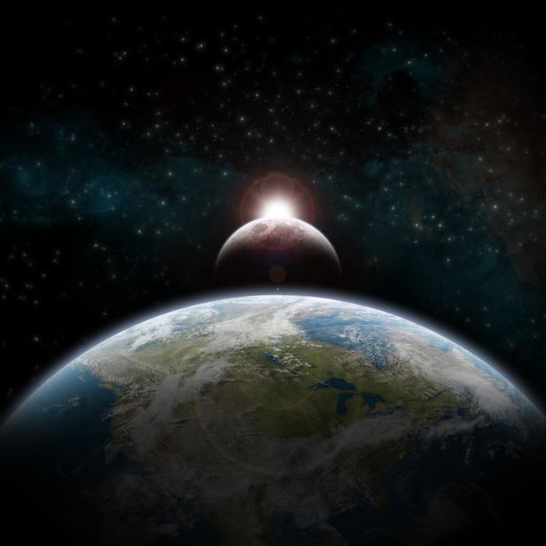 Eine Sonnenfinsternis über der Erde, gesehen aus dem Weltraum.