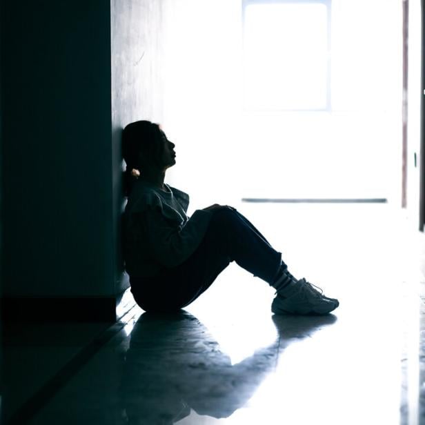 Sadness Teenage Girls Sitting in Tunnel