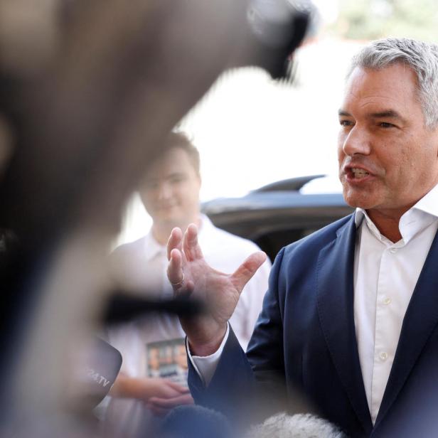 Austrian Chancellor and head of Peoples Party Karl Nehammer addresses the media in Vienna