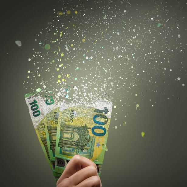 100-Euro-Scheine lösen sich in Luft auf.