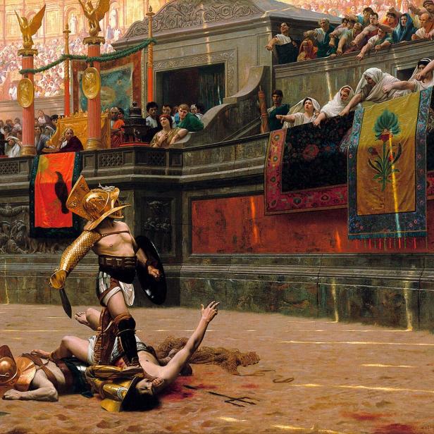 Ein Gladiator steht mit Schwert über einem besiegten Gegner in einer Arena.