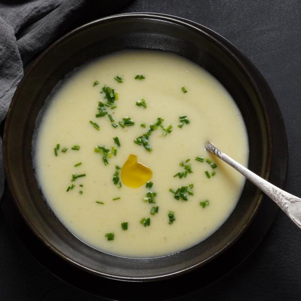 Vichyssoise, classic French chilled cream soup  - potato leek, and  onion topped with chopped chives