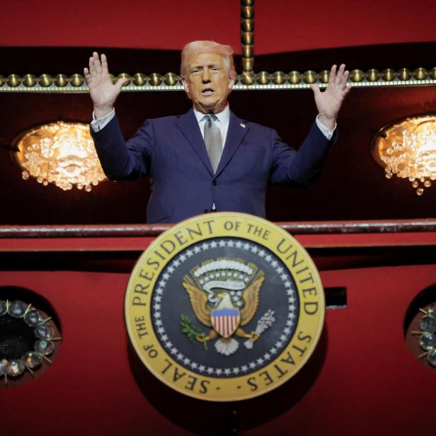 U.S. President Donald Trump stands at the presidential box at the Kennedy Center in Washington