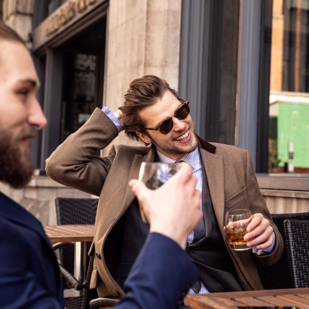 Business break - Two young businessmen taking a break in Central London